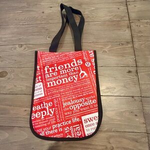 Lululemon tote with clasp, red, black and white, 9”x 12”